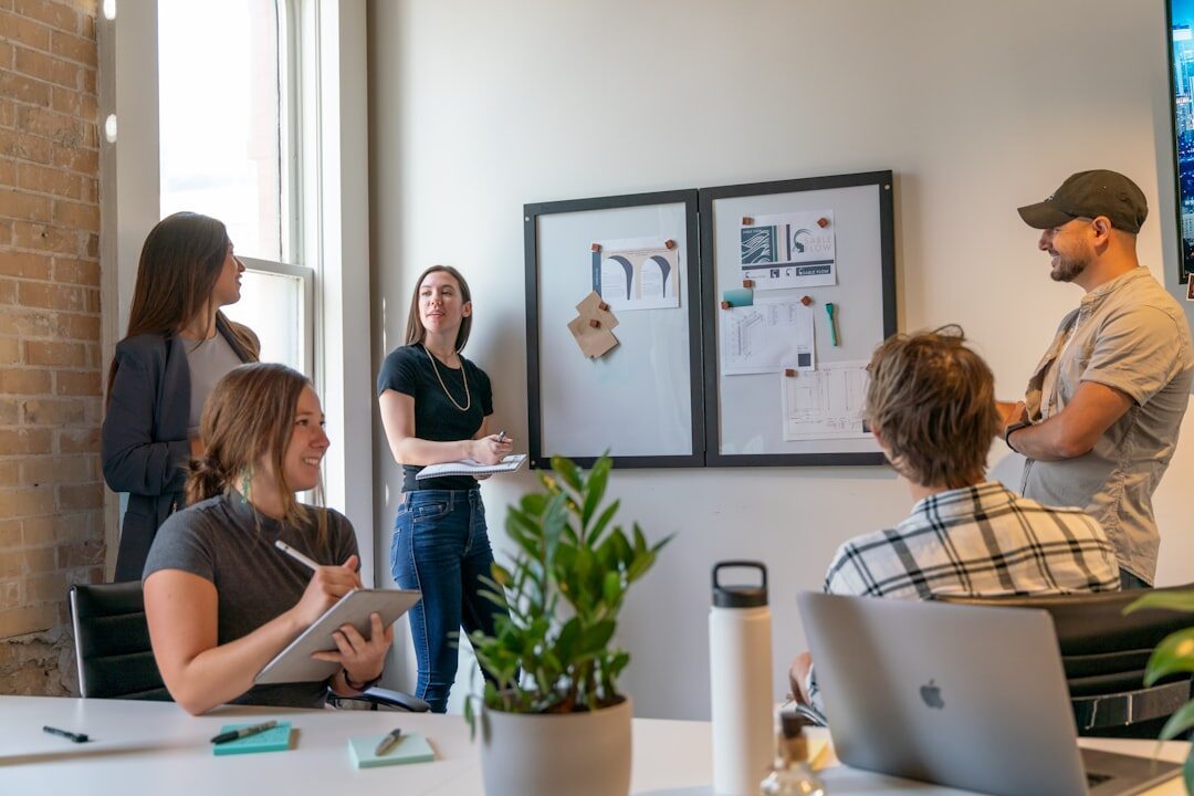 team discussing company growth